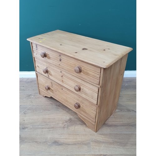 35 - A pine Chest of three long Drawers, 28