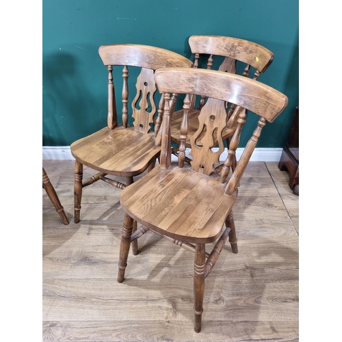 38 - A set of Six modern pierced splat back Kitchen Chairs on turned supports and stretchers. (R4).