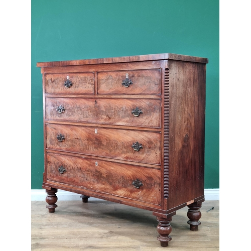 41 - A 19th Century flamed mahogany Chest of two short, three long Drawers raised on turned feet, A/F, 46... 