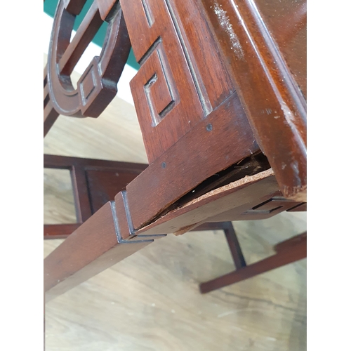 411 - Two hardwood Side Tables with Greek key style friezes, shaped pierced ends on square tapered support... 