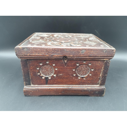 447 - A Folk Art oak small Box with stylised lozenge and roundel carving, 9in, and a Victorian mahogany Te... 