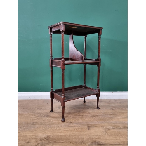 45 - A mahogany three tier Book Stand on turned supports and bun feet, 34