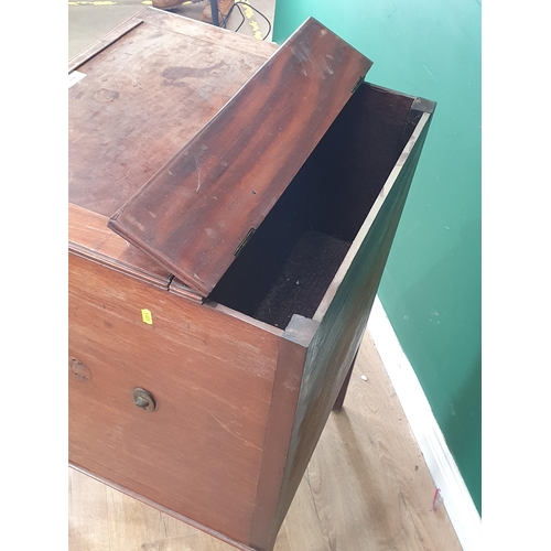 458 - An antique mahogany Wash Stand with lift up top, above single cupboard door and fitted drawer, raise... 