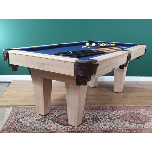 469 - A Pool Table with blue baize, leather style pockets with cues and balls, 2ft 8in H x 6ft 9