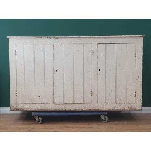 48 - A white painted pine three door Cupboard, A/F (Woodworm in base and backboards), 3ft 5