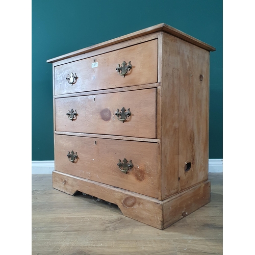 A pine Chest of three long graduated Drawers on plinth base, 30