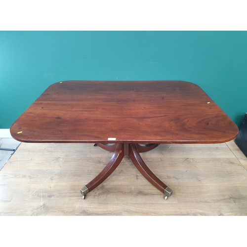 493 - A 19th Century rectangular mahogany tilt top Breakfast Table, on turned column, four splayed support... 