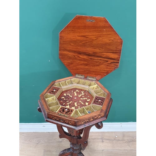 5 - A Victorian Walnut Trumpet Sewing/Work Table, the hinged lid with inlaid floral decorations enclosin... 