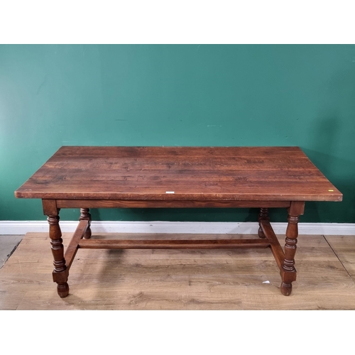 582 - A modern oak Refectory Table on turned supports united by H stretcher, 2ft 6