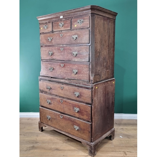 584 - A 19th Century mahogany Chest on Chest, the top section with moulded cornice above three short and t... 