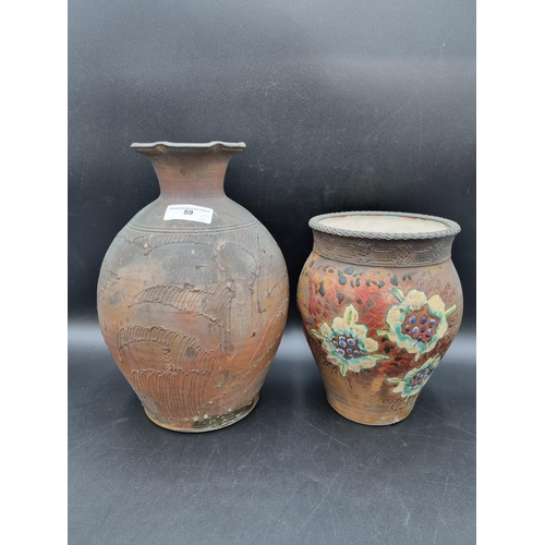 59 - Two Eeles Raku style pottery Vases, one with floral decoration in coloured enamels, 9in, stamped SE,... 