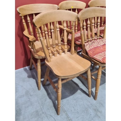 592 - A set of eight beech Spindle back Dining Chairs, two Carvers and six Singles. (R2).