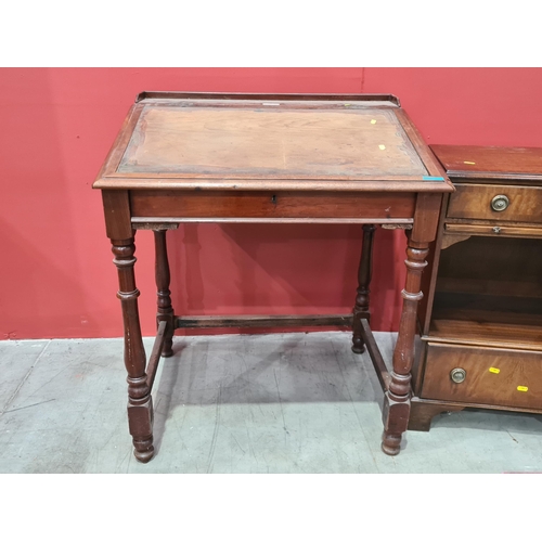 593 - A mahogany Clerk's Desk with low raised gallery, lift-up lid (lacking writing surface), raised on tu... 