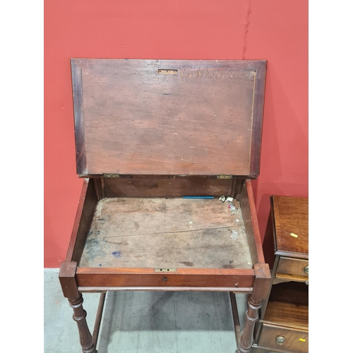 593 - A mahogany Clerk's Desk with low raised gallery, lift-up lid (lacking writing surface), raised on tu... 