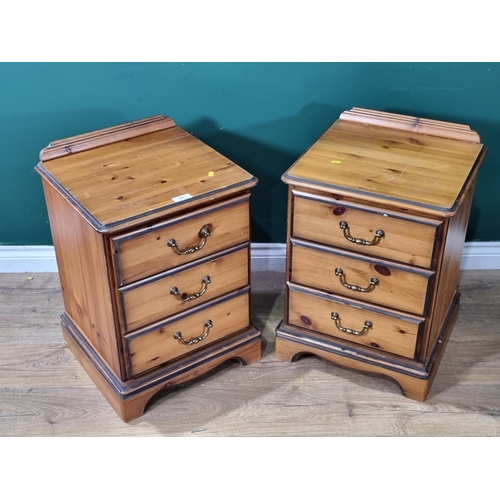 597 - A pair of modern pine Bedside Chests, fitted three drawers on bracket supports, 25in H x 1ft 6in W x... 