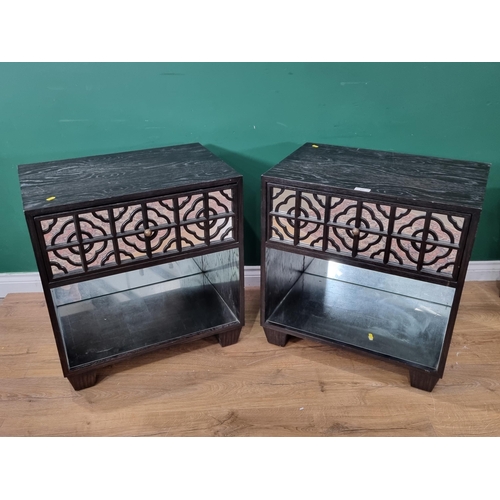 611 - A pair of black ash Chests with mirrored drawers on tapered supports, 2ft 4in H x 26in W x 17in Deep... 