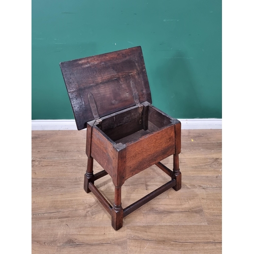 625 - A reproduction oak Box Stool on turned supports and stretchers, 1ft 10in H x 1ft 9in W, (R7)