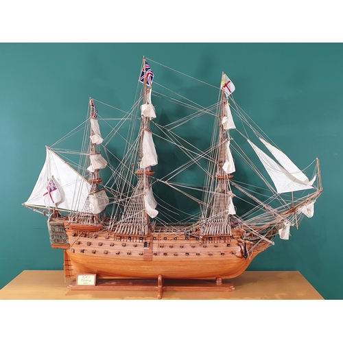 69 - A large wooden Model of H.M.S Victory on stand with rigging and sails, Lifeboats etc, 4ft 10in L app... 