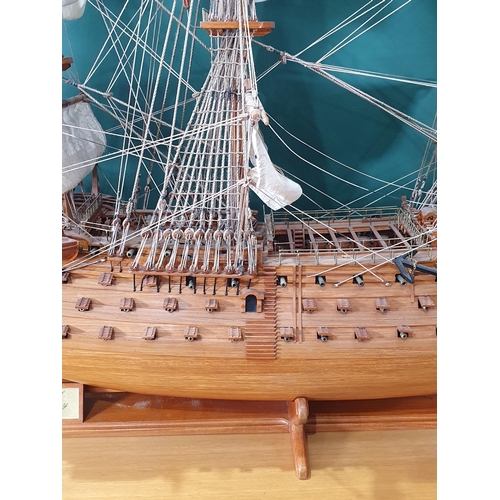 69 - A large wooden Model of H.M.S Victory on stand with rigging and sails, Lifeboats etc, 4ft 10in L app... 