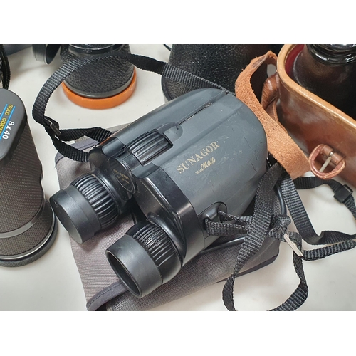 701 - A Box of various Binoculars and a modern Barometer (R9)