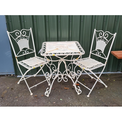 73 - A wlhite painted metal Bistro Set with scroll designs, A/F