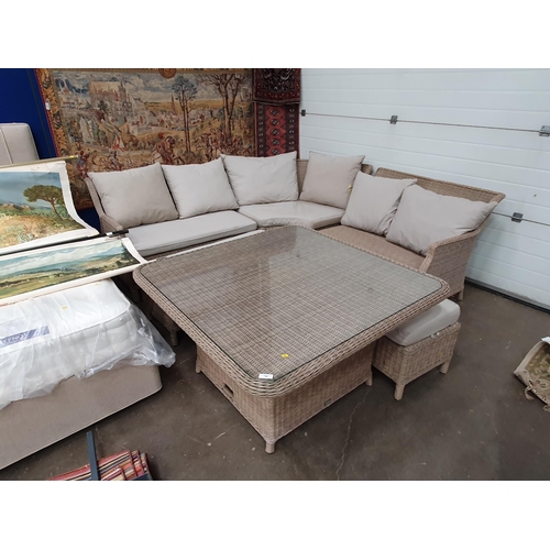 746 - A Bramblecrest Garden Furniture Set comprising of a sectional corner sofa, with square glass-topped ... 