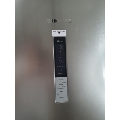 92 - A Samsung Fridge Freezer with water dispenser, 73in H x 28in W, (R9), passed PAT