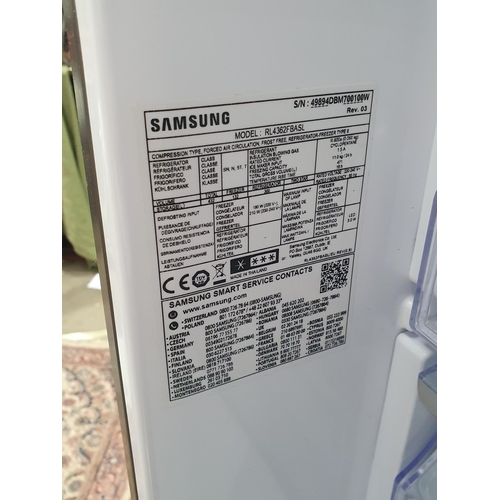 92 - A Samsung Fridge Freezer with water dispenser, 73in H x 28in W, (R9), passed PAT