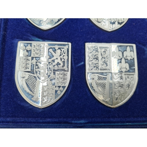 97 - A Set of one dozen silver Shields depicting Royal coats of arms, Birmingham 1977, 570gms, in case