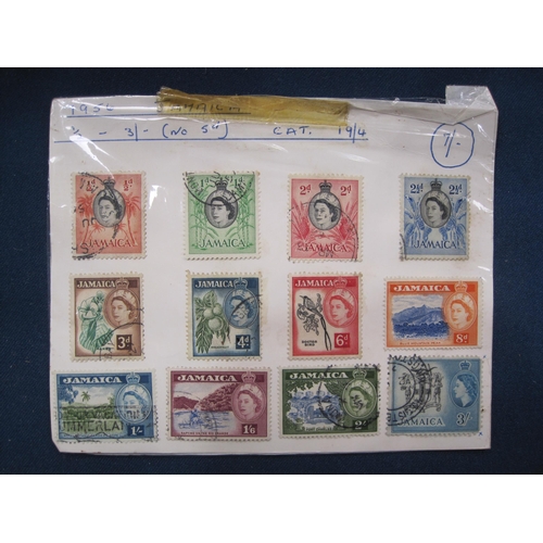 504 - A small quantity of GB QE11 First Day Covers, and other loose stamps (qty)