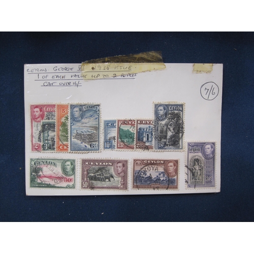 504 - A small quantity of GB QE11 First Day Covers, and other loose stamps (qty)