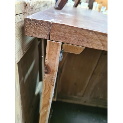 18 - A pine Shop Counter with mahogany top above six panel front, raised on moulded plinth base, 3ft High... 