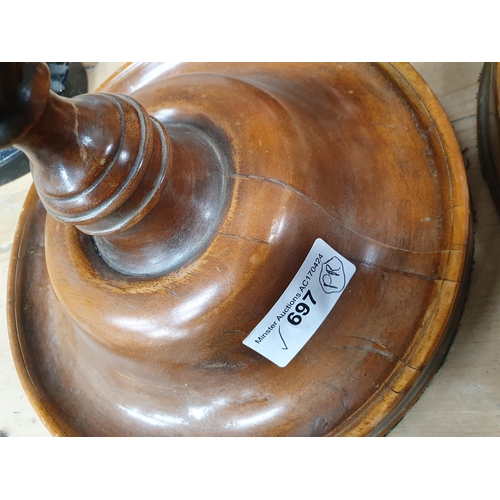 697 - A pair of walnut turned and twisted Candlesticks on stepped dished circular bases, 1ft 11in H (R11)