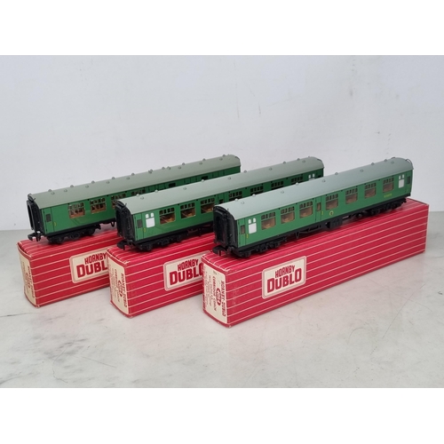 1003 - A rake of three boxed Hornby Dublo S.R. Corridor Coaches, unused and in mint condition. Comprising 2... 