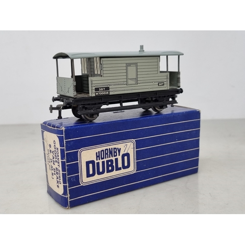 1009 - A rare boxed Hornby Dublo long wheel base L.M.R. Brake Van in mint condition. These brake vans use t... 