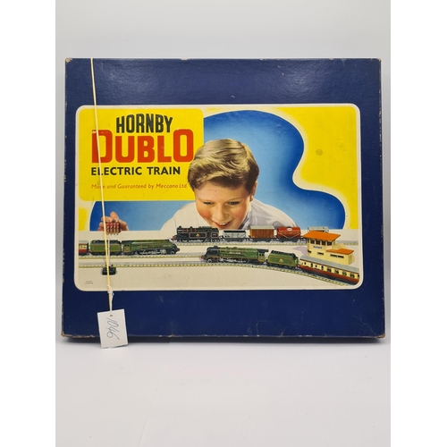 1046 - A boxed Hornby Dublo EDG16 Goods Set, unused with literature. Locomotive in mint condition showing n... 