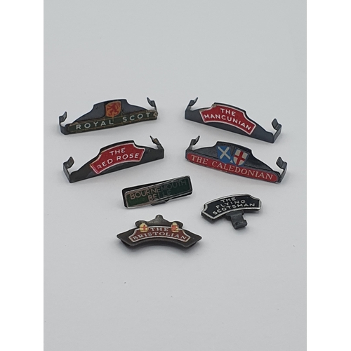 1057 - Seven Hornby Dublo Locomotive Headboards with train names including Bournemouth Belle, Caledonian, F... 