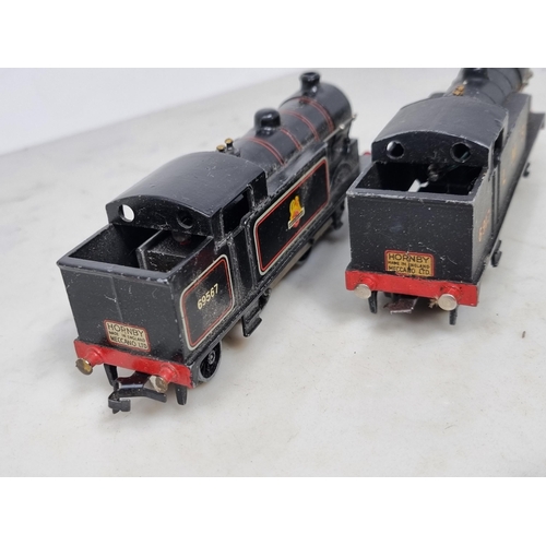 1075 - Two unboxed Hornby Dublo 3-rail 0-6-2T Locomotives, one in LMS black and the other in BR gloss black... 