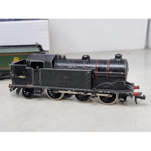 1080 - Two boxed Hornby Dublo EDL12 matt 'Duchess of Montrose' with boxed D12 Tender and unboxed Tender (on... 