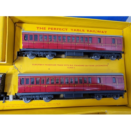 1082 - A boxed Hornby Dublo EDP14 2-6-4T Passenger Set, box lid A/F, contents VG-Ex