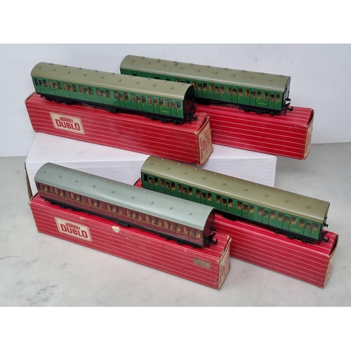 1085 - Two boxed Hornby Dublo 4081 SR Suburban Coaches, a boxed 4082 SR Suburban Brake/2nd Coach and a boxe... 