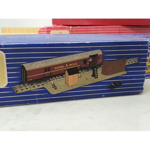 1090 - A boxed Hornby Dublo D1 metal Girder Bridge, a boxed T.P.O Mail Van Set, a 5086 Set of six Platform ... 