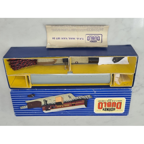 1104 - Two boxed Hornby Dublo 3400 T.P.O Mail Van Sets and a 2400 Mail Van Set