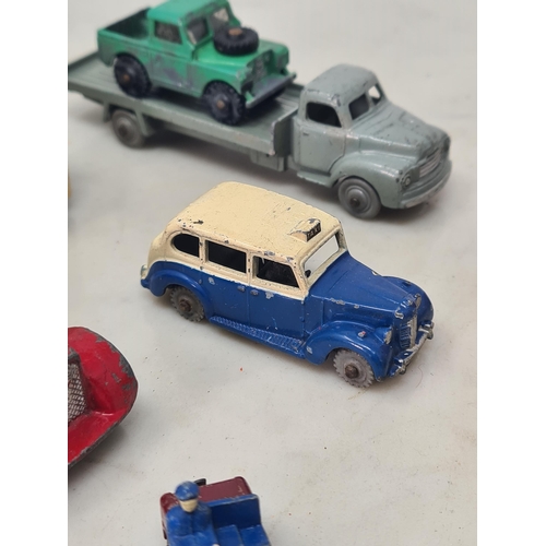 1107 - A collection of unboxed Dublo Dinky Toys including Bedford Flatbed Lorry, Pick-up Truck. Land Rover ... 