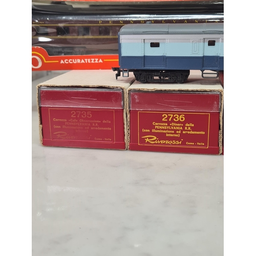 1108 - Eleven boxed Rivarossi HO scale Pennsylvania and other Coaches and an unboxed Santa Fe Mail Coach (1... 