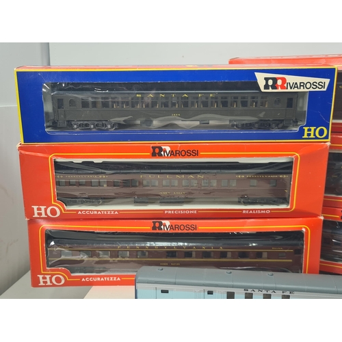 1108 - Eleven boxed Rivarossi HO scale Pennsylvania and other Coaches and an unboxed Santa Fe Mail Coach (1... 