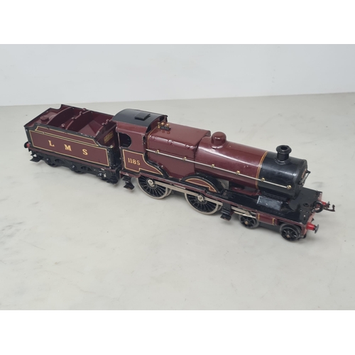 1114 - An unboxed Hornby 0 gauge clockwork 4-4-0 Midland Compound Locomotive and Tender