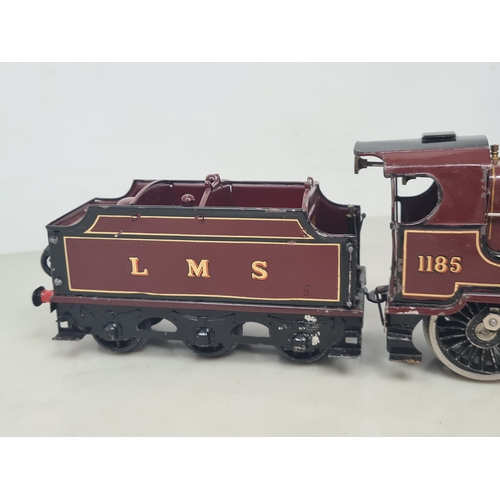 1114 - An unboxed Hornby 0 gauge clockwork 4-4-0 Midland Compound Locomotive and Tender