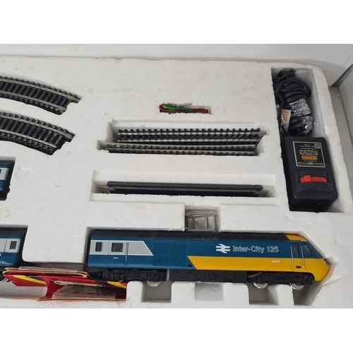 1120 - A Hornby 00 gauge Intercity 125 Set (lacking outer packaging), an unboxed Triang Co-Co diesel Locomo... 