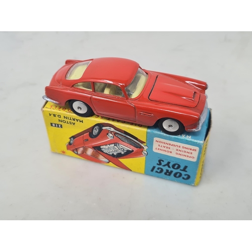 1155 - A boxed Corgi Toys No.218 red Aston Martin DB4, Nr M, box Ex plus